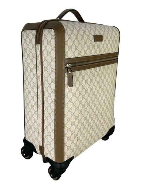 gucci kid supreme four wheel carry-on suitcase|GUCCI GG Supreme Monogram Four Wheel Carry On Suitcase .